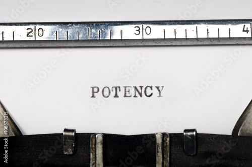 Fotografija word potency typed on typewriter