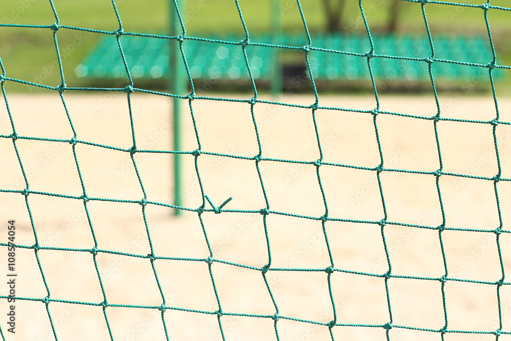 a Net background for the game of volleyball. Volleyball sand court. a Net background for the game of volleyball. Volleyball sand court.