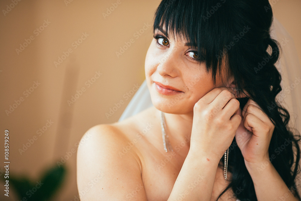 beautiful brunette stylish bride getting ready in the morning in the room beautiful brunette stylish bride getting ready in the morning in the room