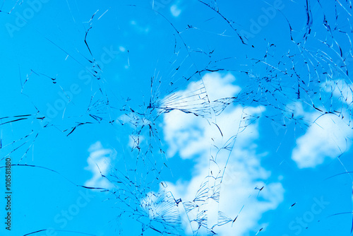 Car accident. Broken cracked automobile windshield glass 