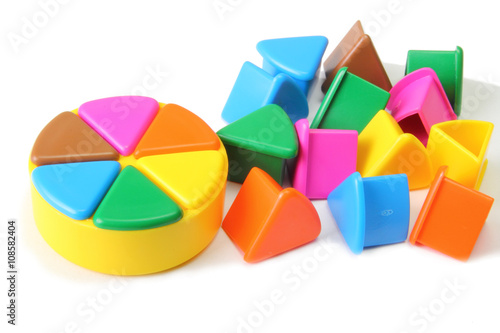 Trivial Pursuit pieces on a white background photo