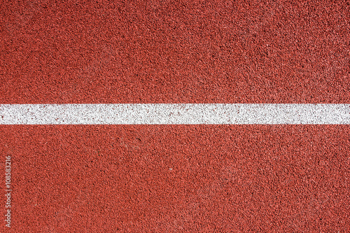 Running track with white line texture. © Paweł Michałowski