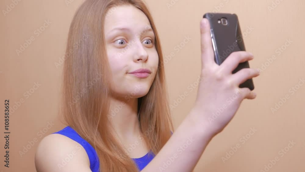 Teen girl having fun and taking selfies, 4K UHD. Teen girl having fun and taking selfies, 4K UHD.