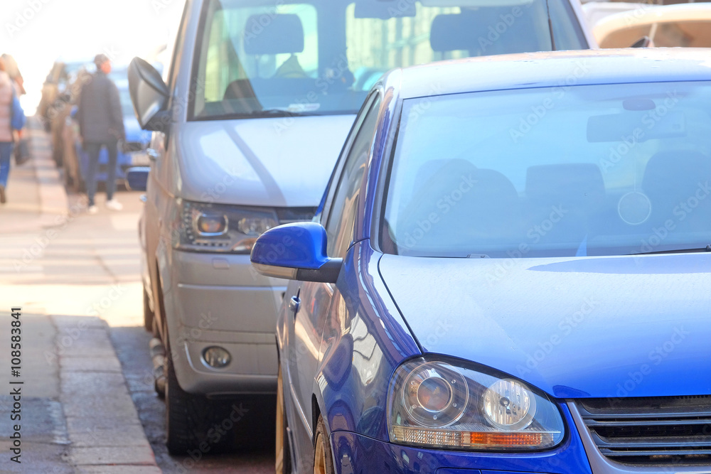 Helsinki, Finland - April, 4, 2016: the parking cars in Helsinki, Finland Helsinki, Finland - April, 4, 2016: the parking cars in Helsinki, Finland