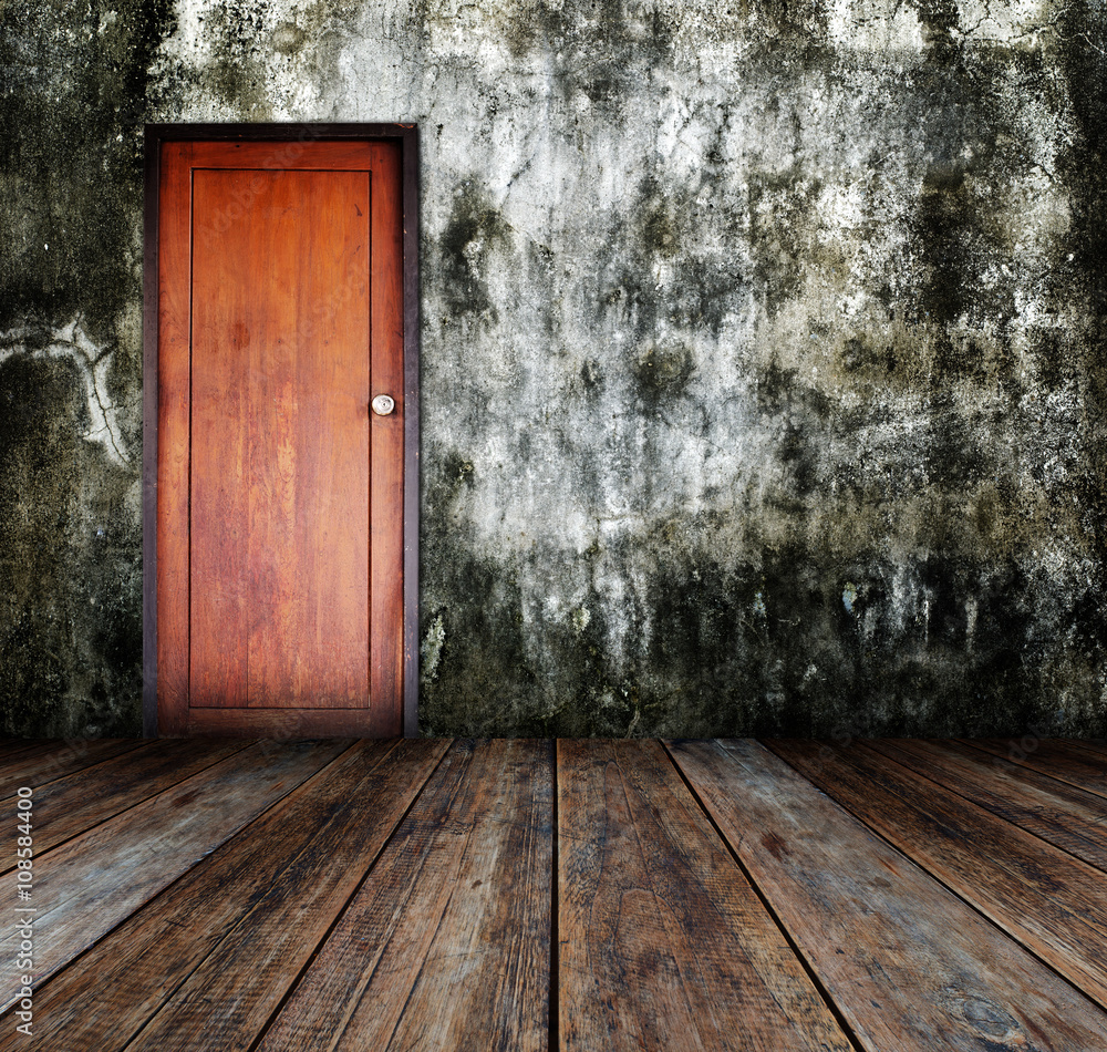 Door in grunge room. Door in grunge room.