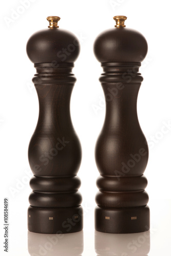 Stylish wooden salt and pepper mill isolated over white