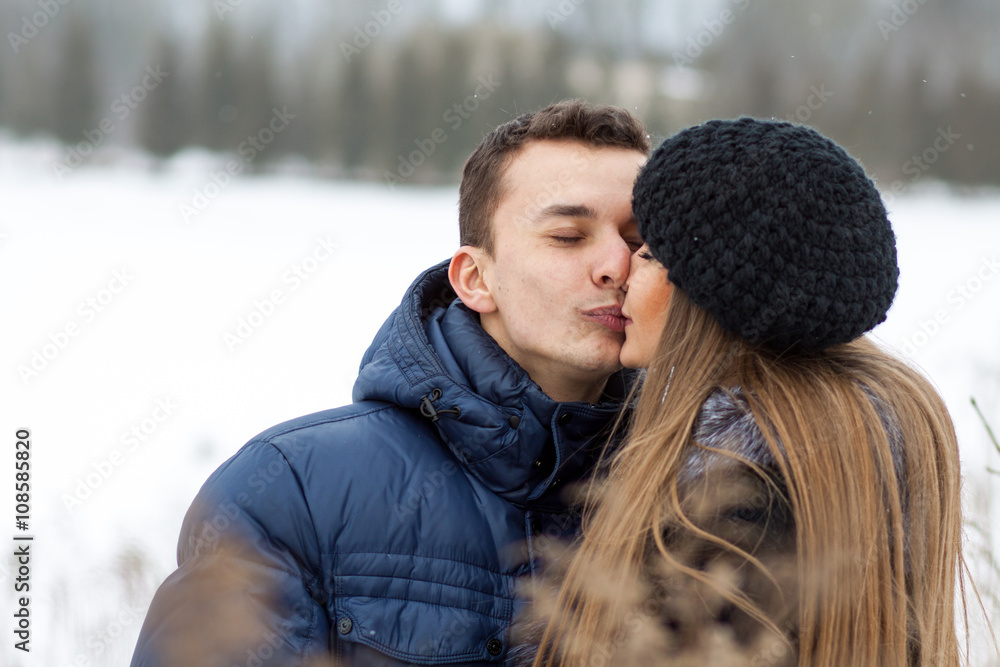 Happy Young Couple in Winter field Happy Young Couple in Winter field