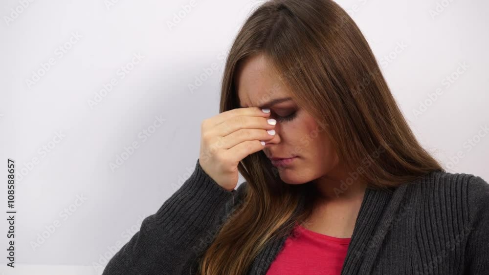 Woman face sad or sinus pressure pain 4K Woman face sad or sinus pressure pain 4K