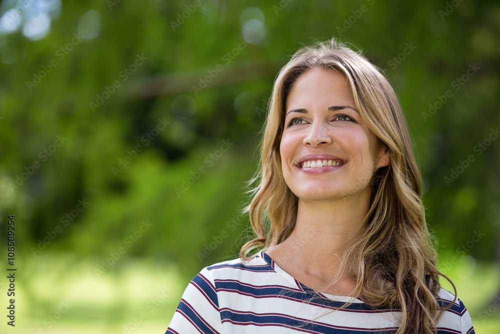 Beautiful smiling woman looking away Beautiful smiling woman looking away