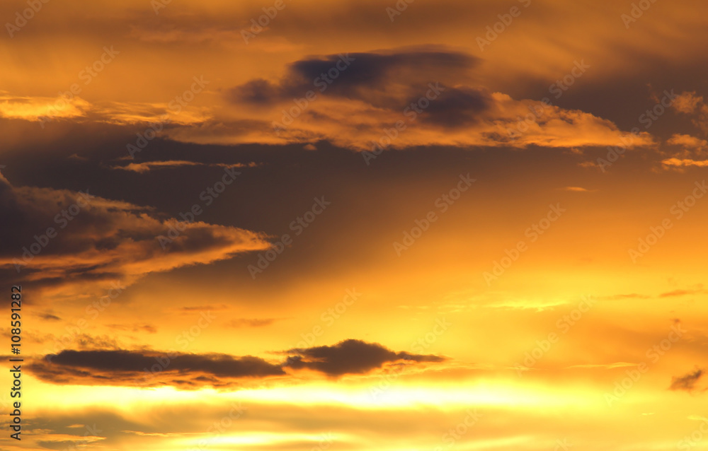 Fototapeta premium Natural background of the gold color sky and cloud, During the time sunrise and sunset