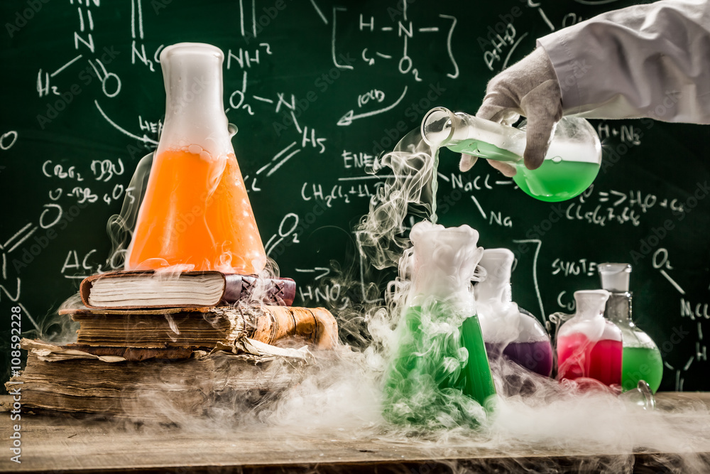 Checking the chemical formula in school laboratory - obrazy, fototapety, plakaty 