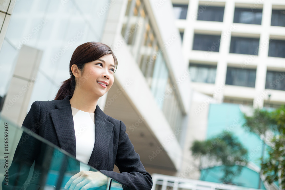 Business woman standing at outdoor Business woman standing at outdoor