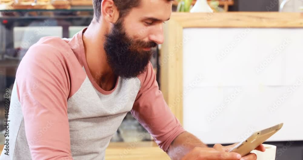 Hipster man using tablet Hipster man using tablet