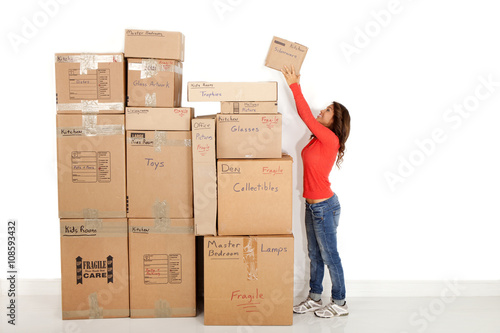 Woman packing and getting ready to move