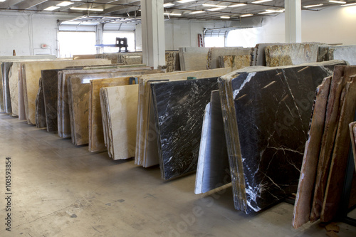 Slabs of granite in a storage warehouse.
Construction Material