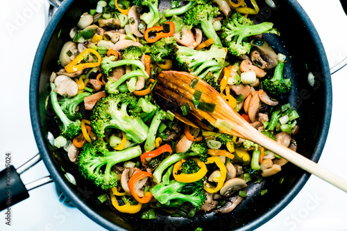 Elevated view Vivid color stir fry pan. Food, cooking, healthy eating and kitchen concept