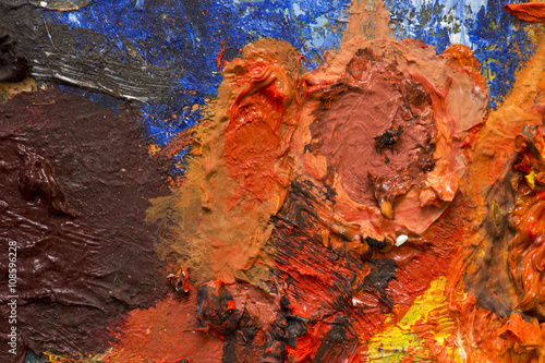 Абстрактный фон из масляных красок на палитре художника
