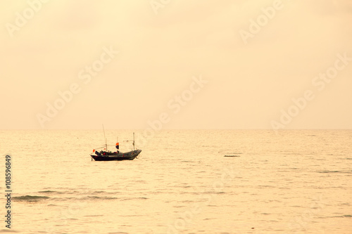 Small lonely fishing boat floating on flat surface of adriatic s © bubbers