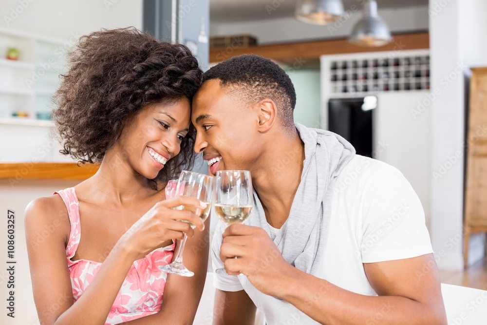 Young couple toasting wine glasses Young couple toasting wine glasses