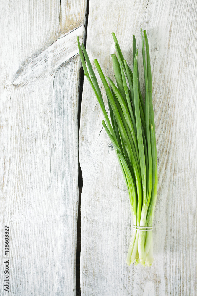 fresh onion on wooden surface fresh onion on wooden surface