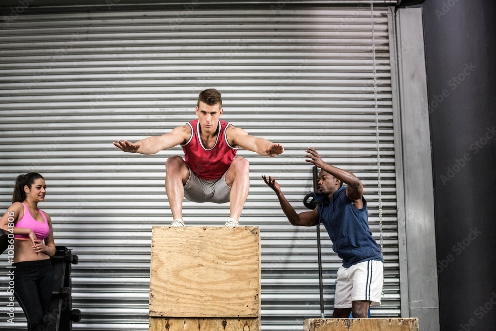 Naklejka premium Fit people exercising together