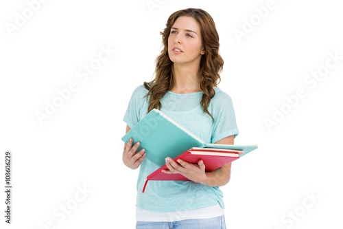 Young woman holding books
