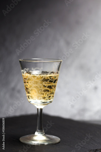 elegant liqueur glass over slate