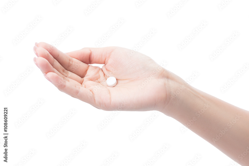 Woman hand holding pill isolated on white with clipping path Woman hand holding pill isolated on white with clipping path