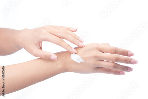 Woman hands with cream woman applying cream isolated on white with clipping path