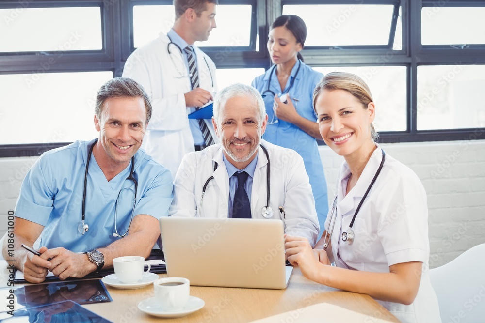 Portrait of medical team smiling in conference room