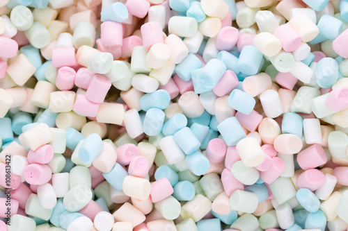 Background or texture of colorful mini marshmallows. photo
