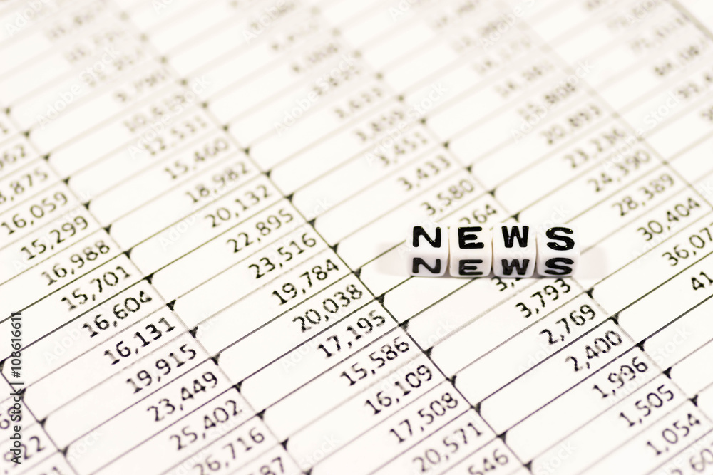 Cubes with the text, NEWS, on spreadsheet Cubes with the text, NEWS, on spreadsheet