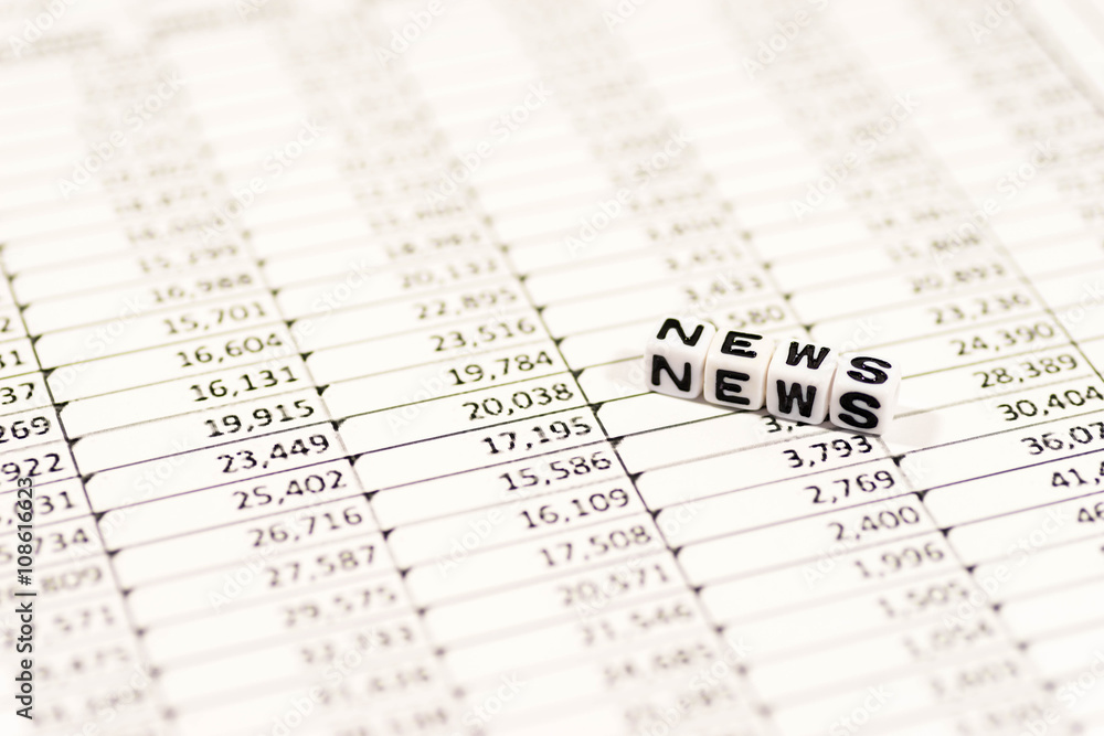 Cubes with the text, NEWS, on spreadsheet Cubes with the text, NEWS, on spreadsheet