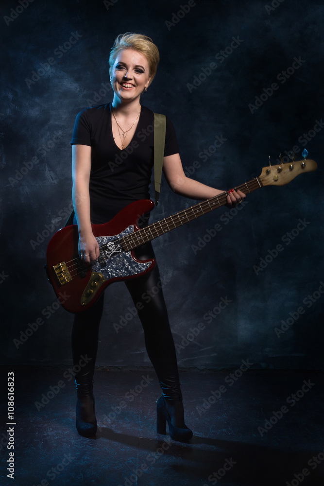 Fototapeta premium Rock star playing bass guitar