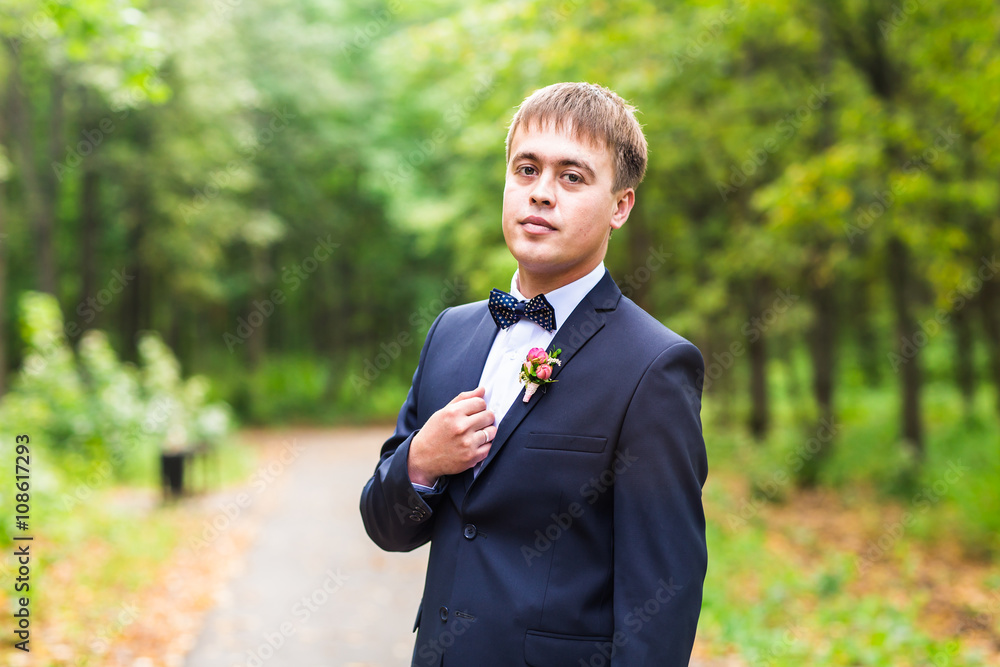 Portrait of the groom on their wedding day. Portrait of the groom on their wedding day.