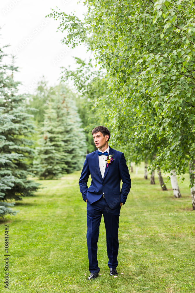 Sexy man in tuxedo and bow tie posing Sexy man in tuxedo and bow tie posing