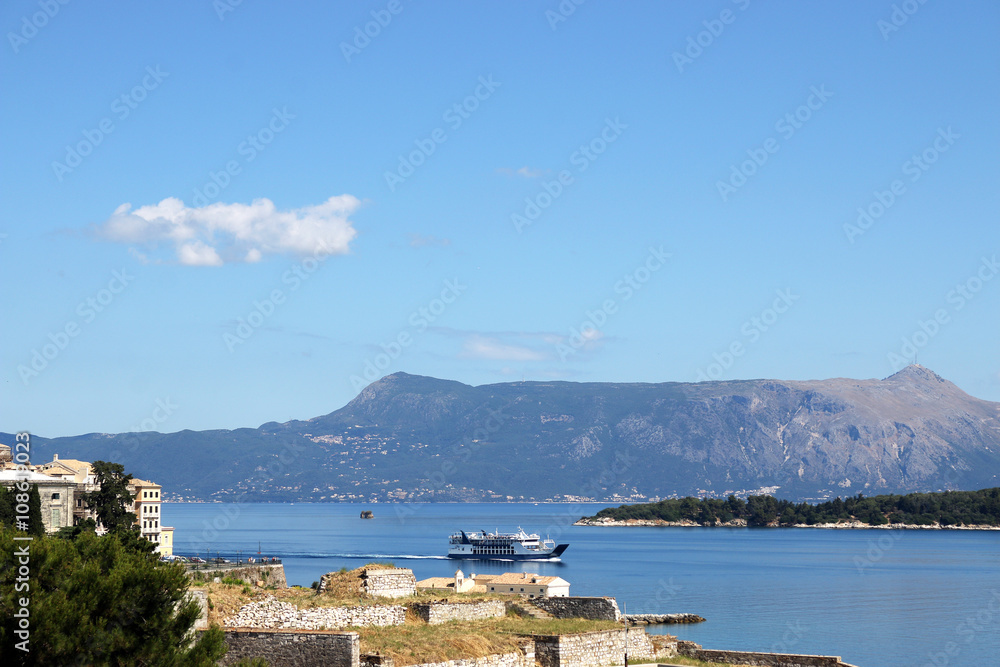 ferry boat sailing near Corfu island summer vacation - obrazy, fototapety, plakaty 