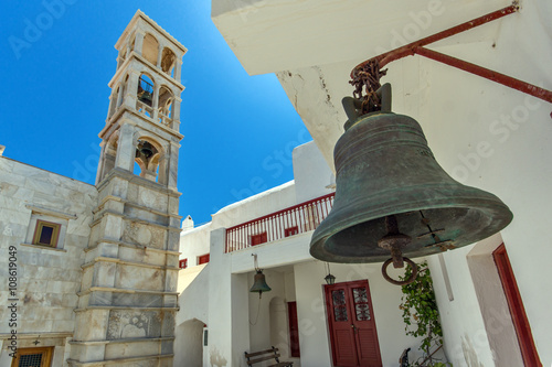 Belfry of of Panagia Tourliani monastery inTown of Ano Mera, island of Mykonos, Cyclades, Greece photo