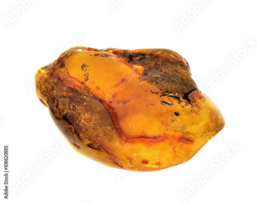 piece of baltic amber isolated on white background