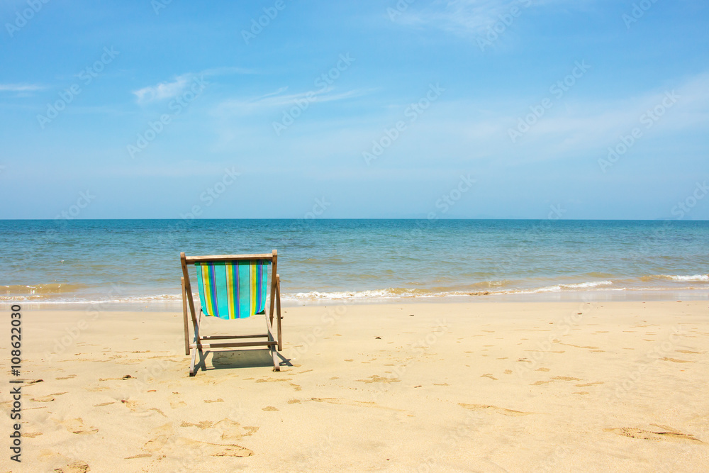 Deckchair, chair on the beach in sunshine day. Deckchair, chair on the beach in sunshine day.