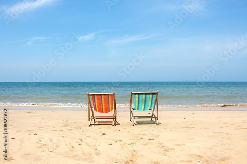 Deckchair, chair on the beach in sunshine day.