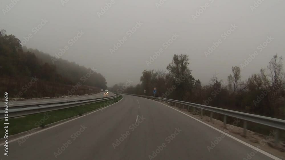 Car moving in the fog and rain. Car moving in the fog and rain.
