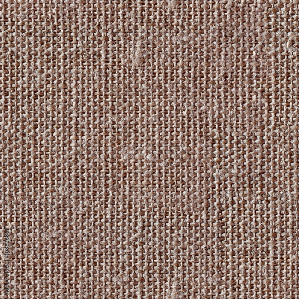 Brown canvas texture or background. Seamless square texture. Tile ready. Brown canvas texture or background. Seamless square texture. Tile ready.