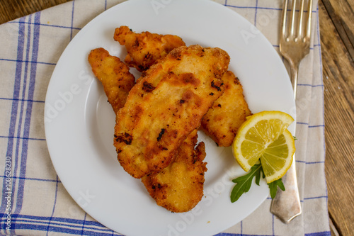 Wiener schnitzel with potato salad photo