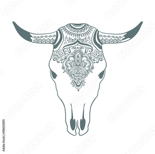 Hand drawn cow skull with ornament. Bohemian design. Vector illustration.