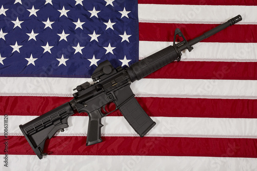 AR15 M4A1 M16 Style Weapon Automatic Rifle on USA Flag photo