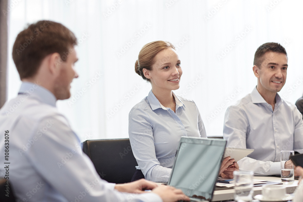smiling business people with tablet pc in office smiling business people with tablet pc in office