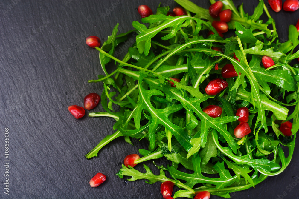 Fresh Arugula on Black background. Fresh Arugula on Black background.