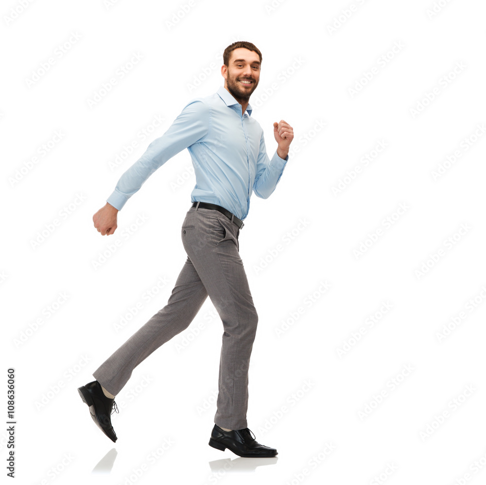 smiling young man running away smiling young man running away