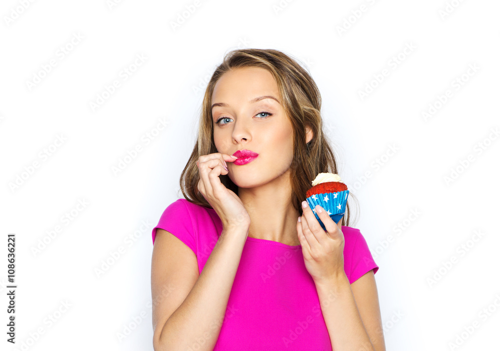 happy woman or teen girl with birthday cupcake happy woman or teen girl with birthday cupcake